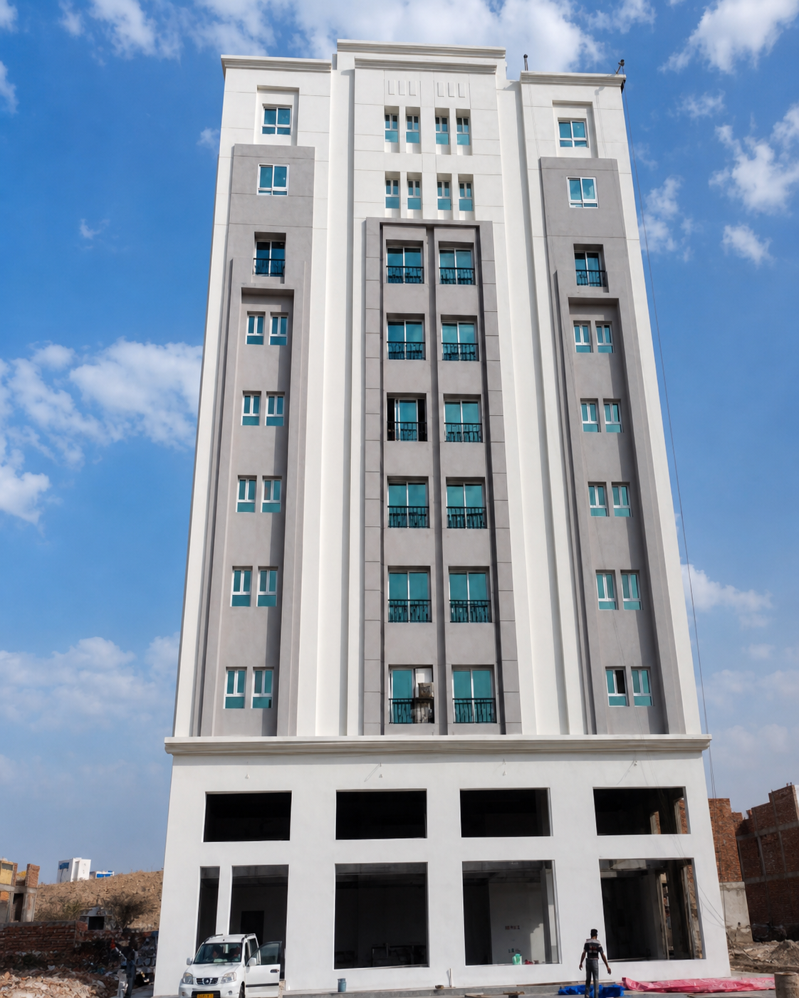 Grey commercial building from the KAI Oman company profile